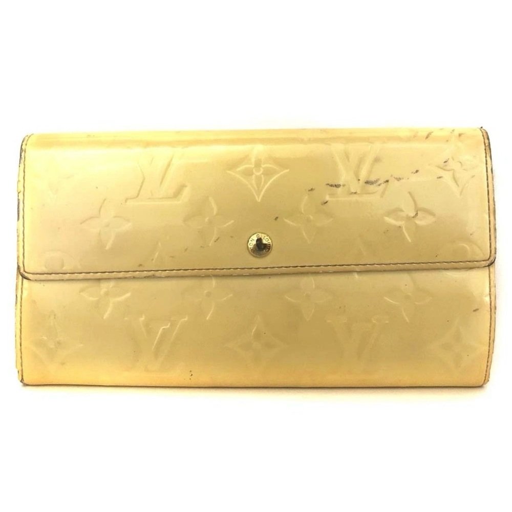 Louis Vuitton Cream Wallet with Embossed Design